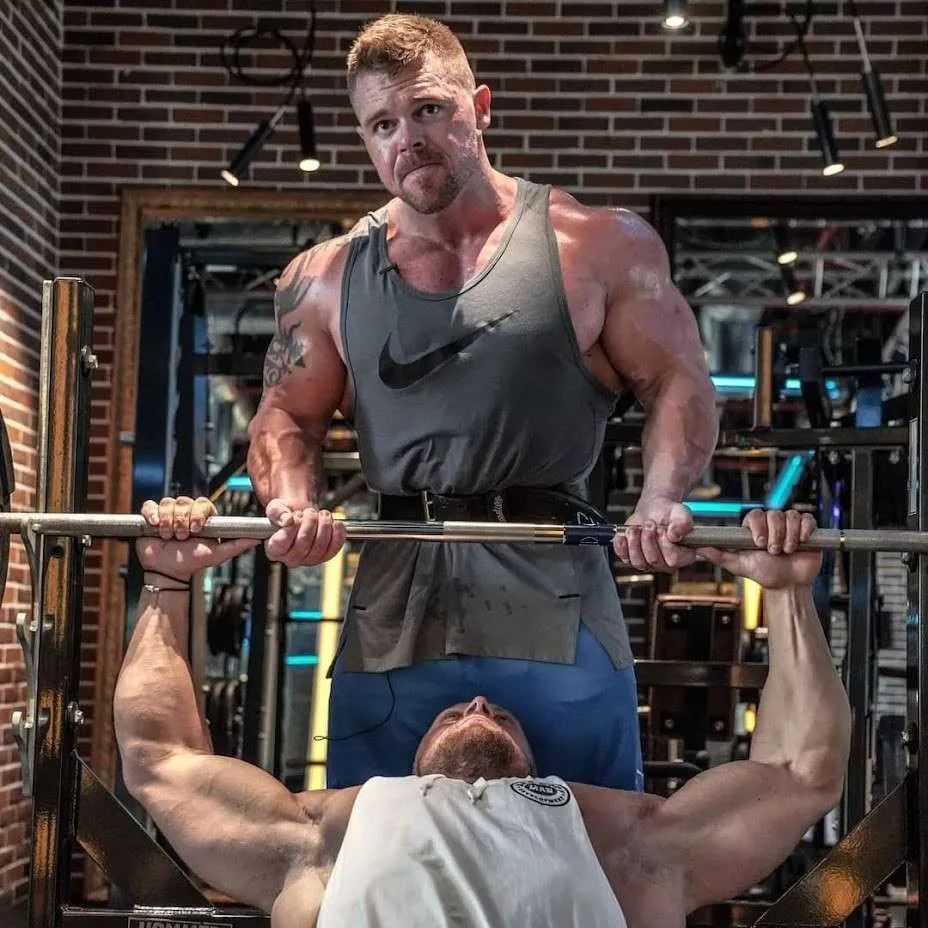 Comparison of strength vs hypertrophy training, highlighting key differences in muscle growth and strength development.